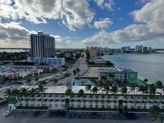 a view of a lake and a garden