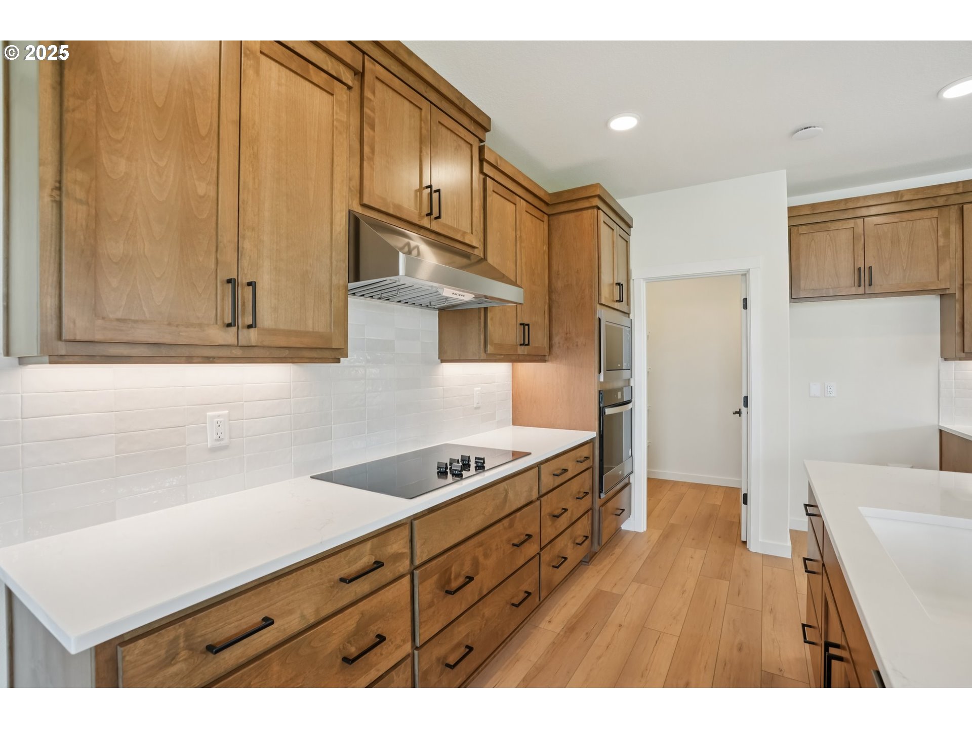 1101 North 44th Place Ridgefield, WA 98642 - Photo 8 of 48 a kitchen with stainless steel appliances granite countertop a sink and cabinets