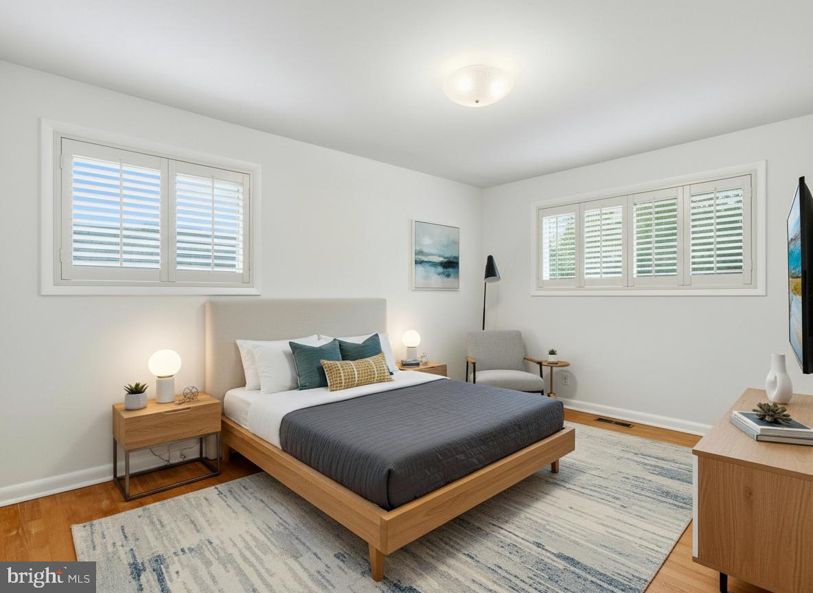 1454 Roxanna Road Northwest Washington, DC 20012 - Photo 21 of 48 a bedroom with a bed and window