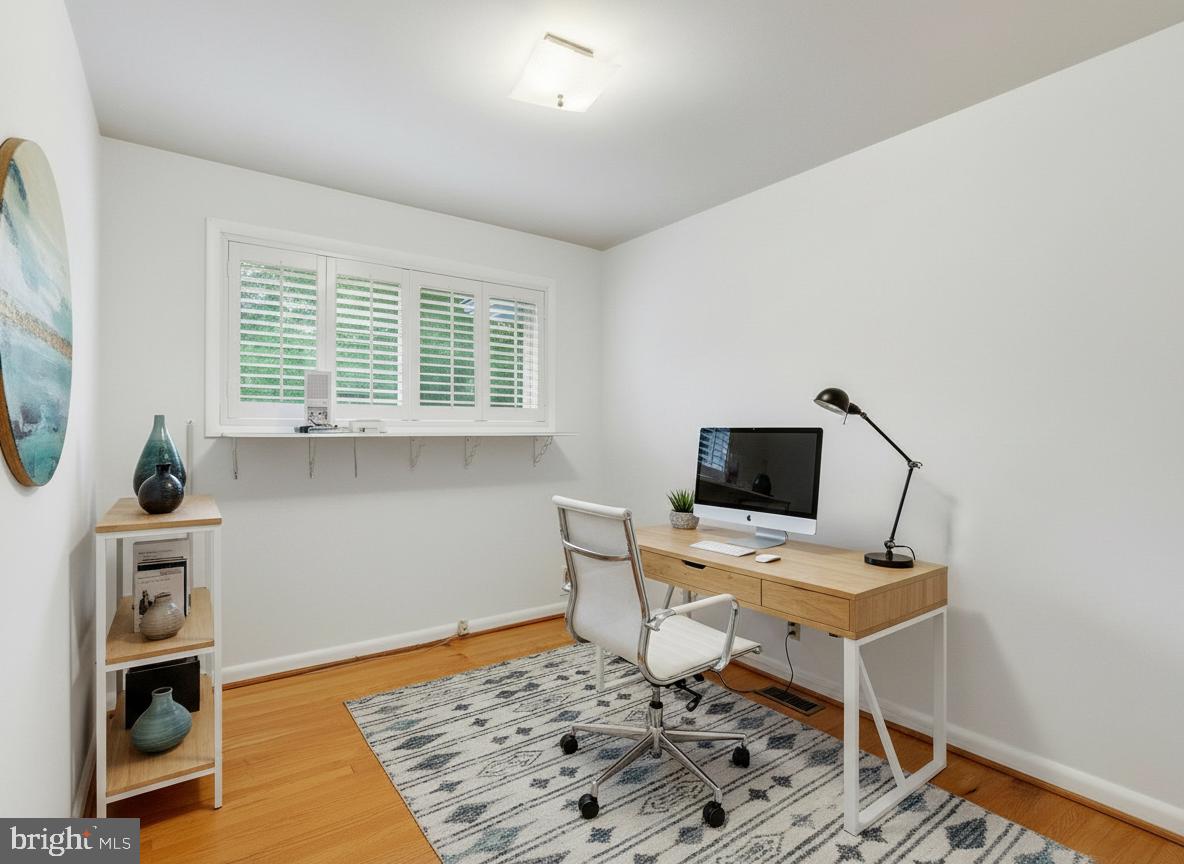 1454 Roxanna Road Northwest Washington, DC 20012 - Photo 24 of 48 a workspace with furniture and a window