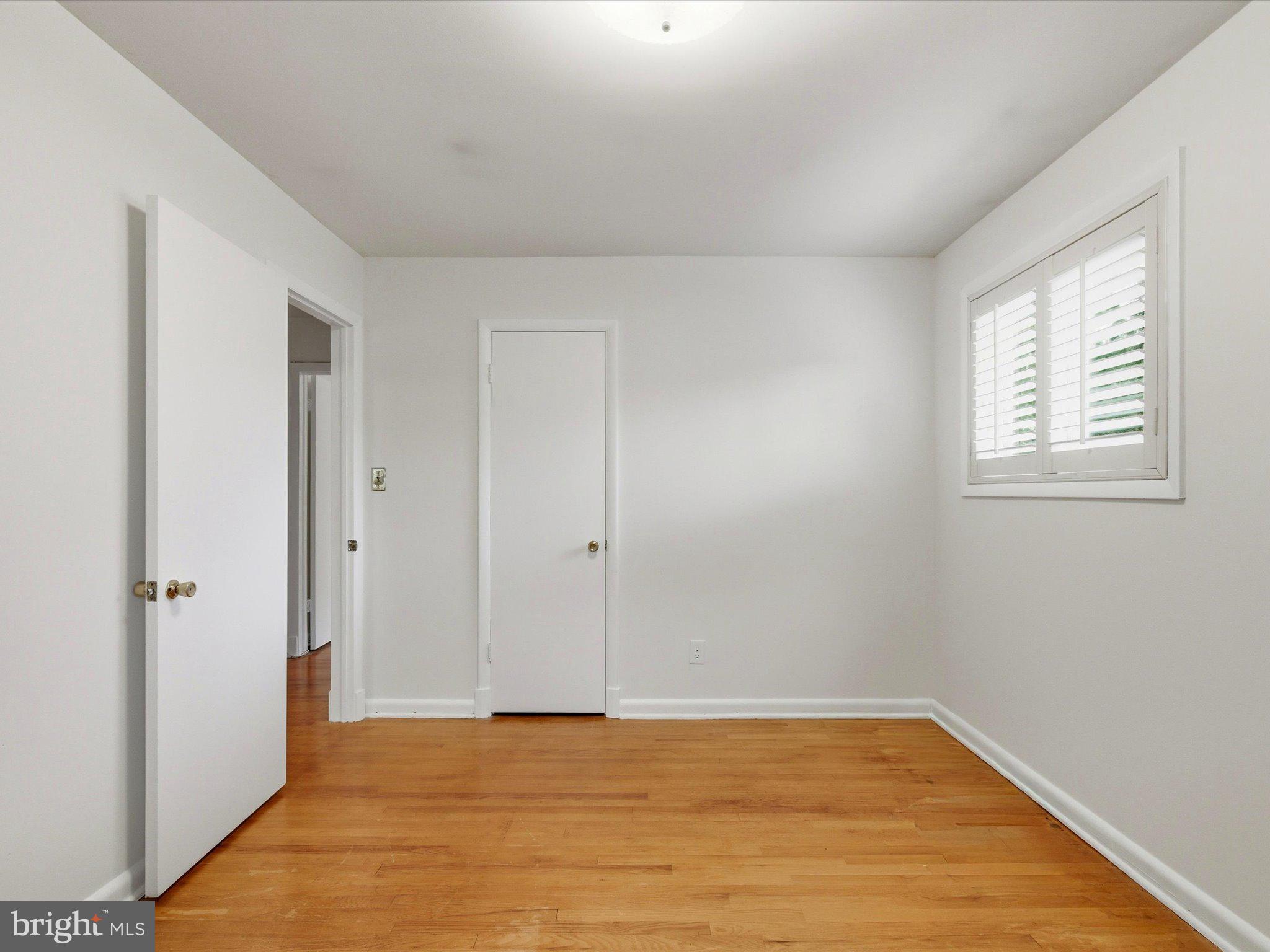 1454 Roxanna Road Northwest Washington, DC 20012 - Photo 26 of 48 an empty room with window