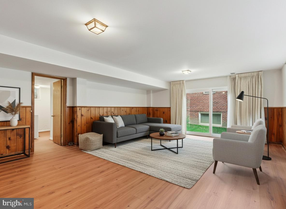 1454 Roxanna Road Northwest Washington, DC 20012 - Photo 28 of 48 a living room with furniture and a large window