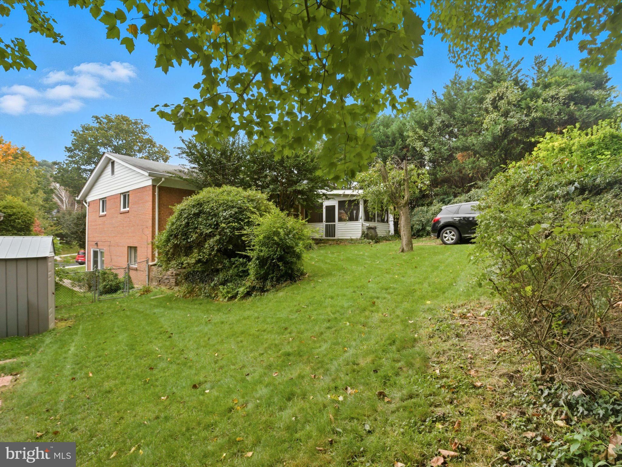 1454 Roxanna Road Northwest Washington, DC 20012 - Photo 45 of 48 a view of a house with a backyard