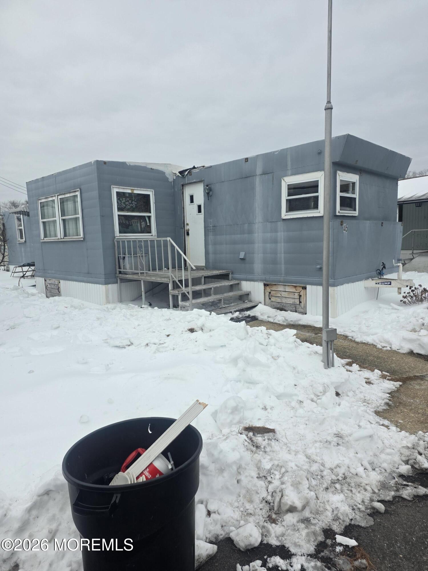 45 Locust Grove Hazlet, NJ 07730 - Photo 3 of 14 a room with wooden floor and sink