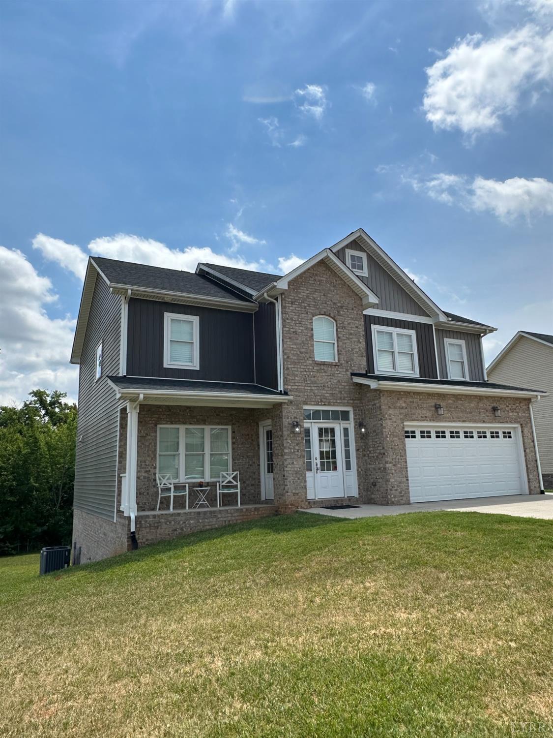 193 Turning Point Drive Evington, VA 24550 - Photo 4 of 6 front view of a house with a yard