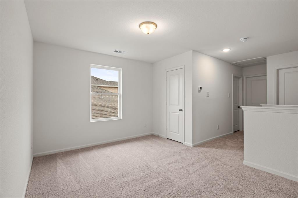619 Colgate Circle Princeton, TX 75407 - Photo 26 of 31 a view of an empty room with a window