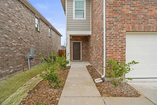 a view of a backyard with a garden