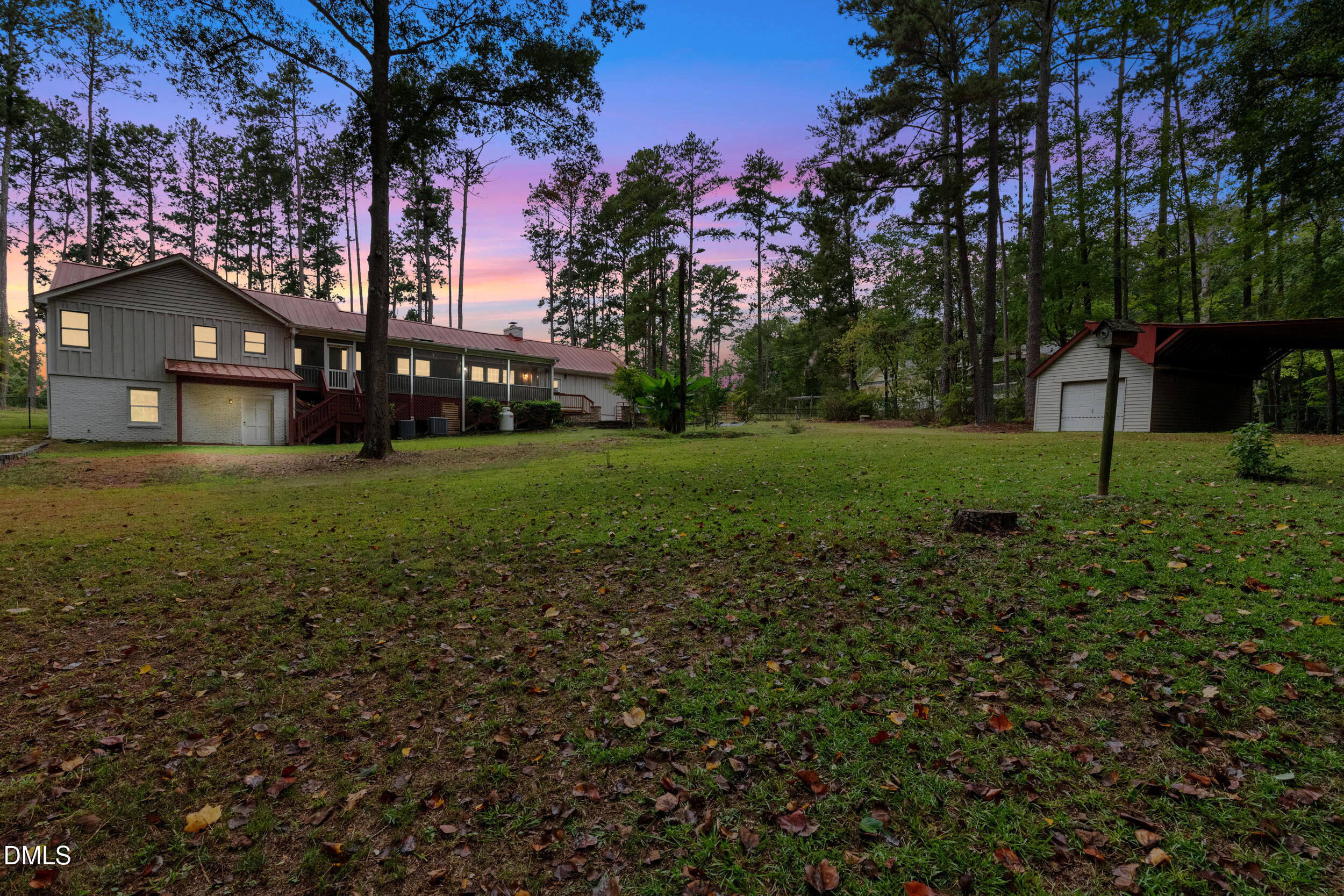 2329 Win Road Garner, NC 27529 - Photo 3 of 90 Expansive lot with mature trees, a detached storage building, and a carport
