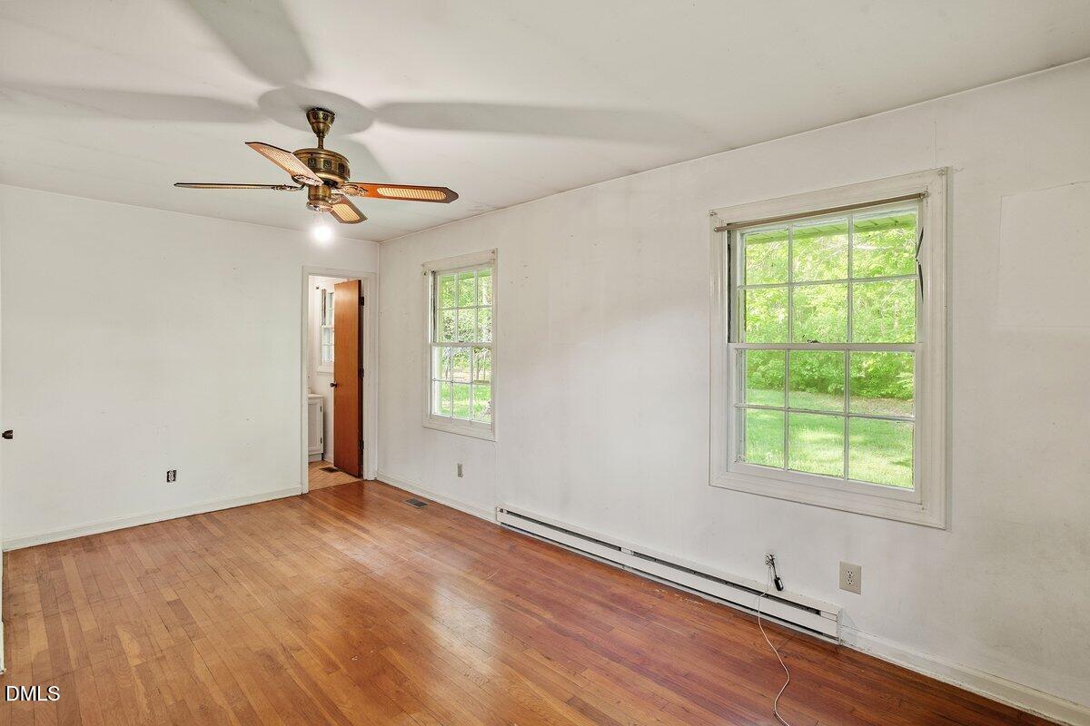 122 Richmond Road Mebane, NC 27302 - Photo 12 of 17 a view of an empty room with a window