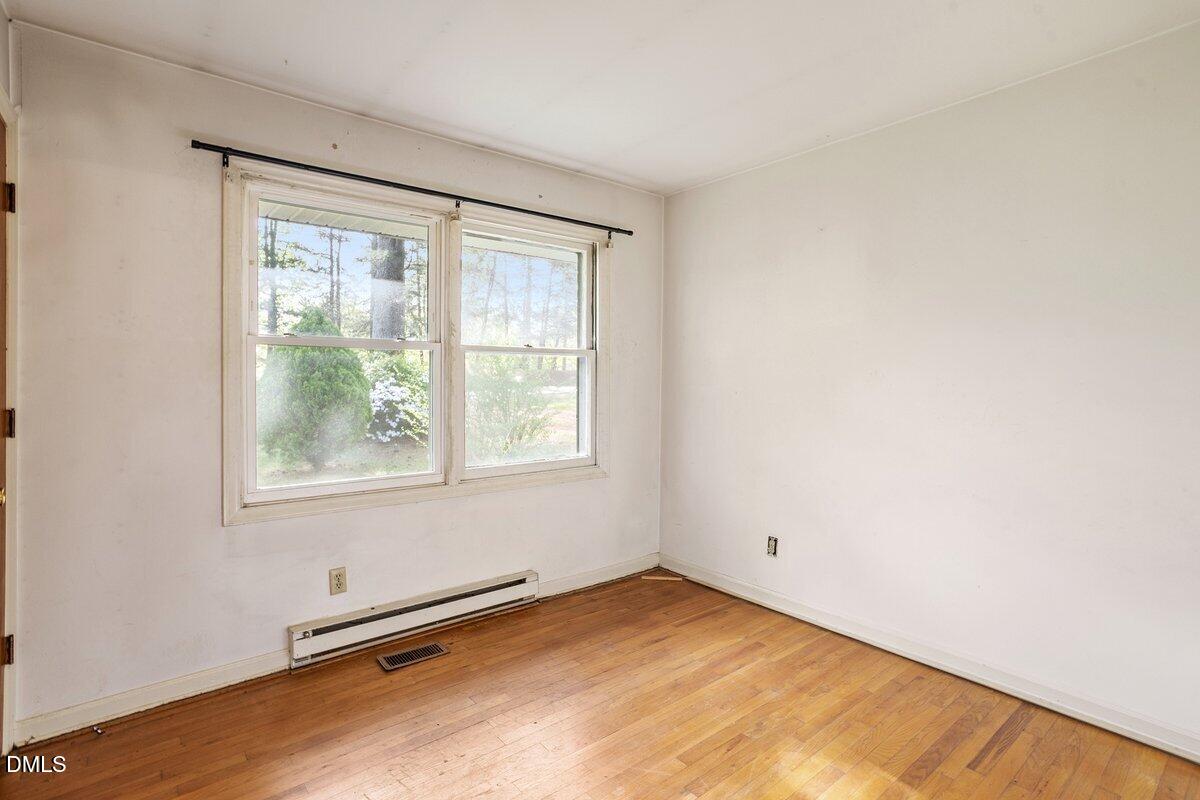 122 Richmond Road Mebane, NC 27302 - Photo 17 of 17 an empty room with a window