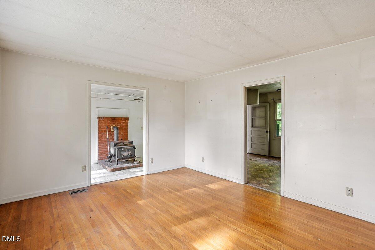 122 Richmond Road Mebane, NC 27302 - Photo 6 of 17 wooden floor in an empty room