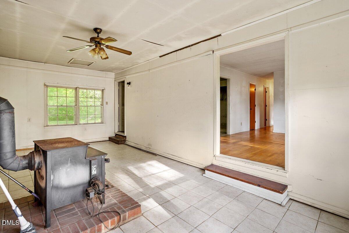 122 Richmond Road Mebane, NC 27302 - Photo 8 of 17 a view of a livingroom with furniture and windows