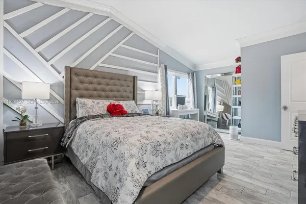 a bedroom with a bed and a closet