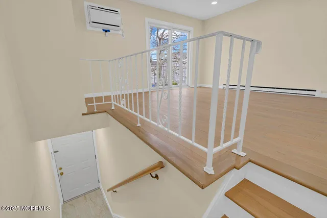 a view of entryway with a front door