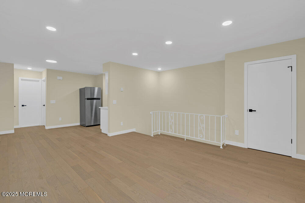114 3rd Avenue, Unit 8 Belmar, NJ 07719 - Photo 6 of 13 a view of empty room
