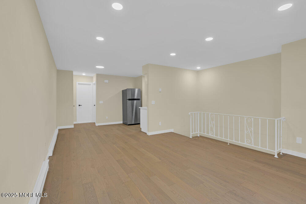 114 3rd Avenue, Unit 8 Belmar, NJ 07719 - Photo 7 of 13 a view of an empty room