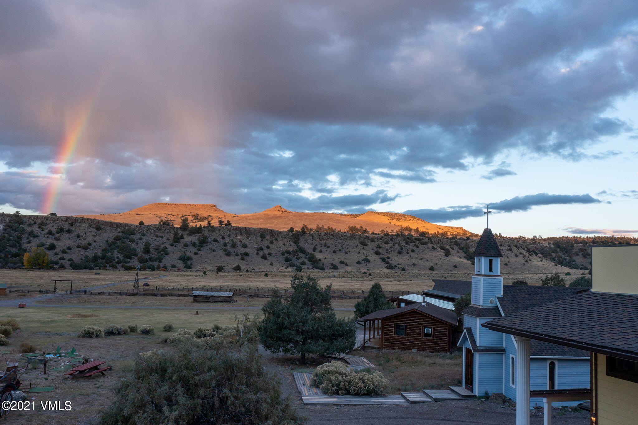 36710 County Rd CC 36 Saguache, CO 81149 - Photo 5 of 23 a view of a town with mountains in the background