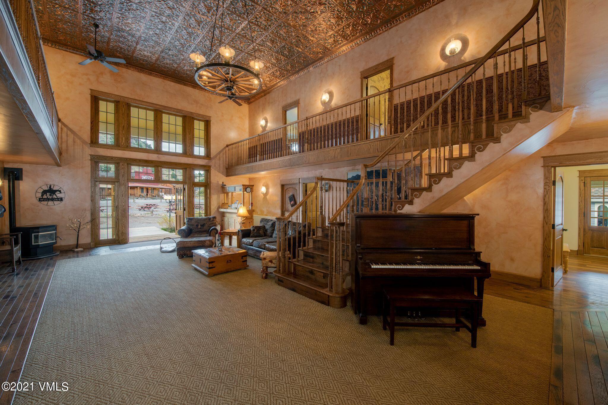 36710 County Rd CC 36 Saguache, CO 81149 - Photo 8 of 23 a view of entryway wih livingroom and stairs