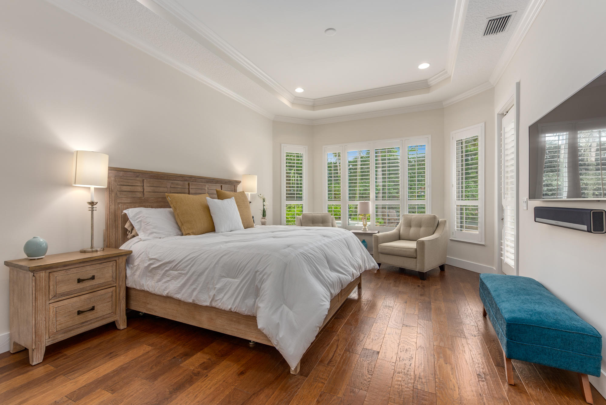 148 Beacon Lane Jupiter Inlet Colony, FL 33469 - Photo 22 of 30 a bedroom with a bed and a large window
