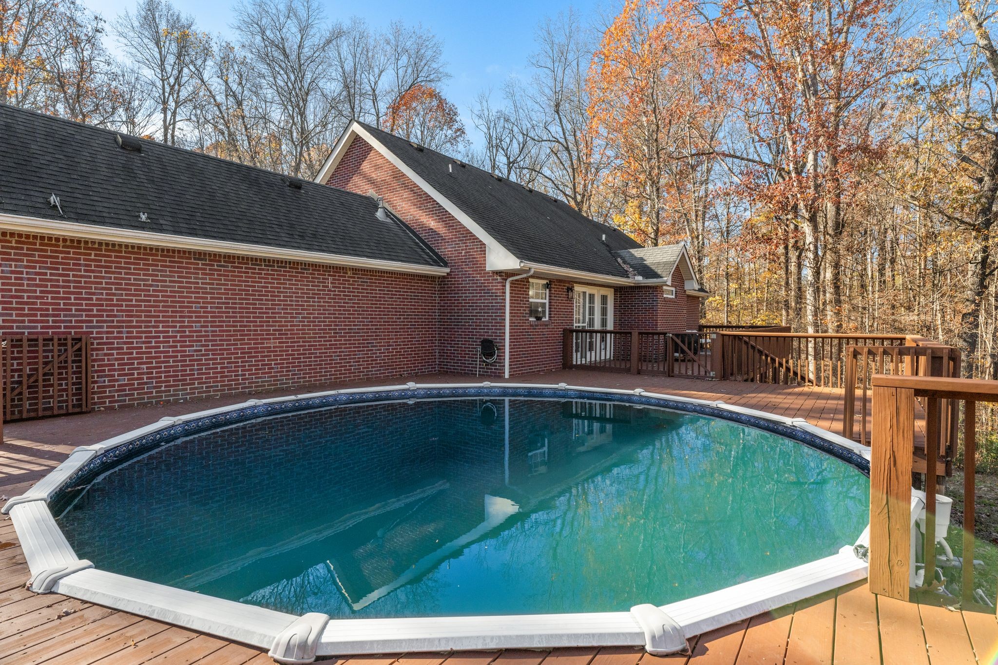 1283 Garton Road Burns, TN 37029 - Photo 23 of 28 a view of a swimming pool with a yard