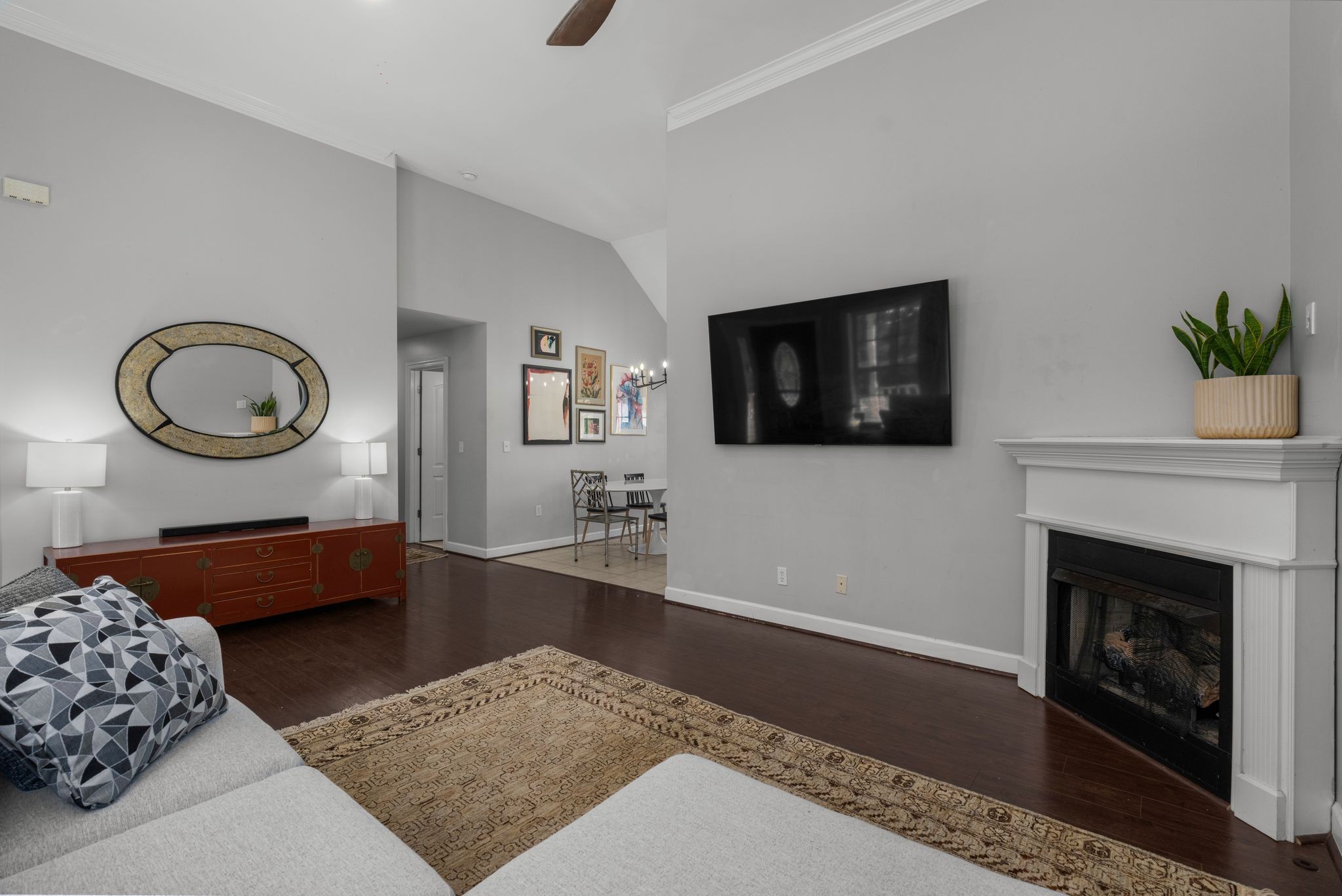 1283 Garton Road Burns, TN 37029 - Photo 8 of 28 a living room with furniture a flat screen tv and a fireplace
