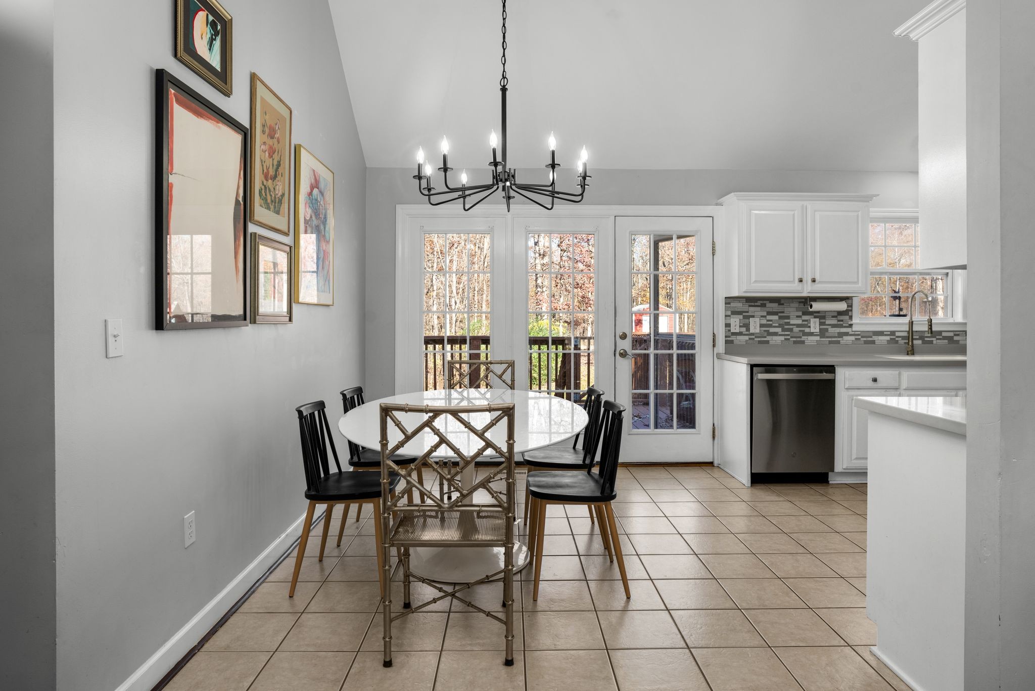 1283 Garton Road Burns, TN 37029 - Photo 9 of 28 a view of a dining room with furniture and a chandelier
