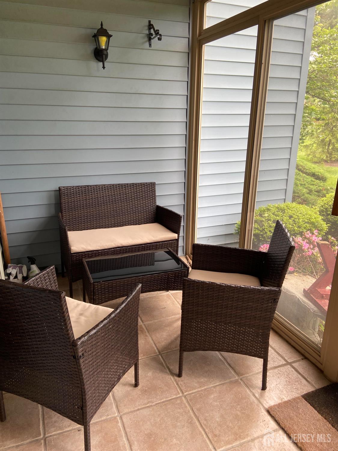 8 Benjamin Franklin Drive, Unit C Monroe Township, NJ 08831 - Photo 1 of 9 a view of a outdoor seating area