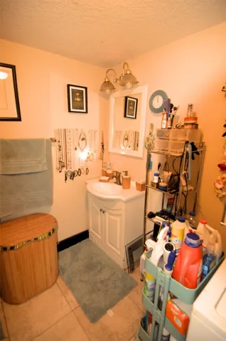 a view of a room with workspace and a window