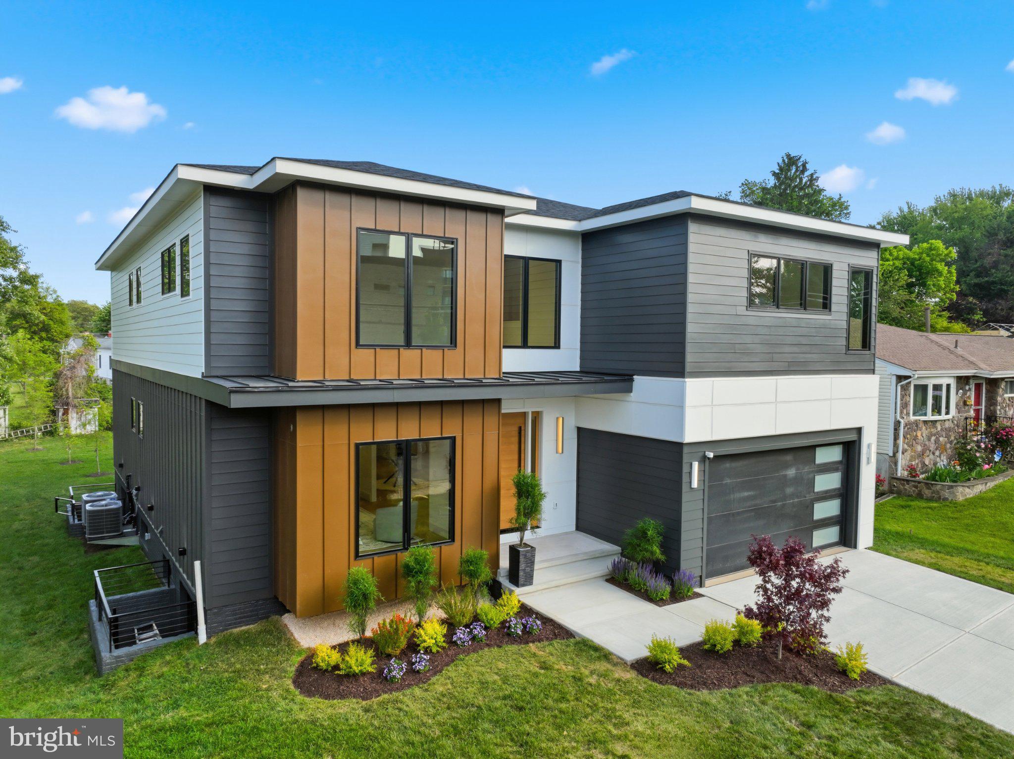 7421 Magarity Road Falls Church, VA 22043 - Photo 3 of 66 Modern elegance meets natural charm.