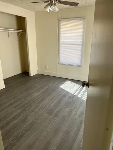 a bathroom with a sink a toilet and vanity