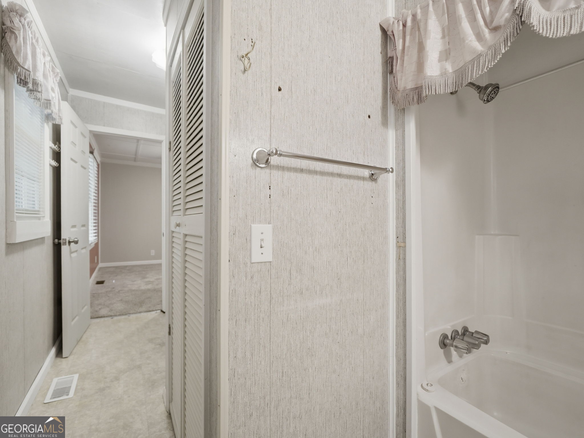 629 Goose Island Road Cherry Log, GA 30522 - Photo 20 of 52 a bathroom with a bathtub and shower