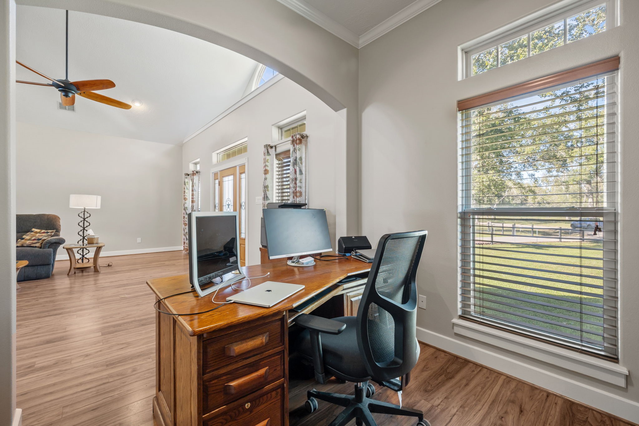 3998 County Road 612 Angleton, TX 77515 - Photo 11 of 47 a workspace with furniture and wooden floor