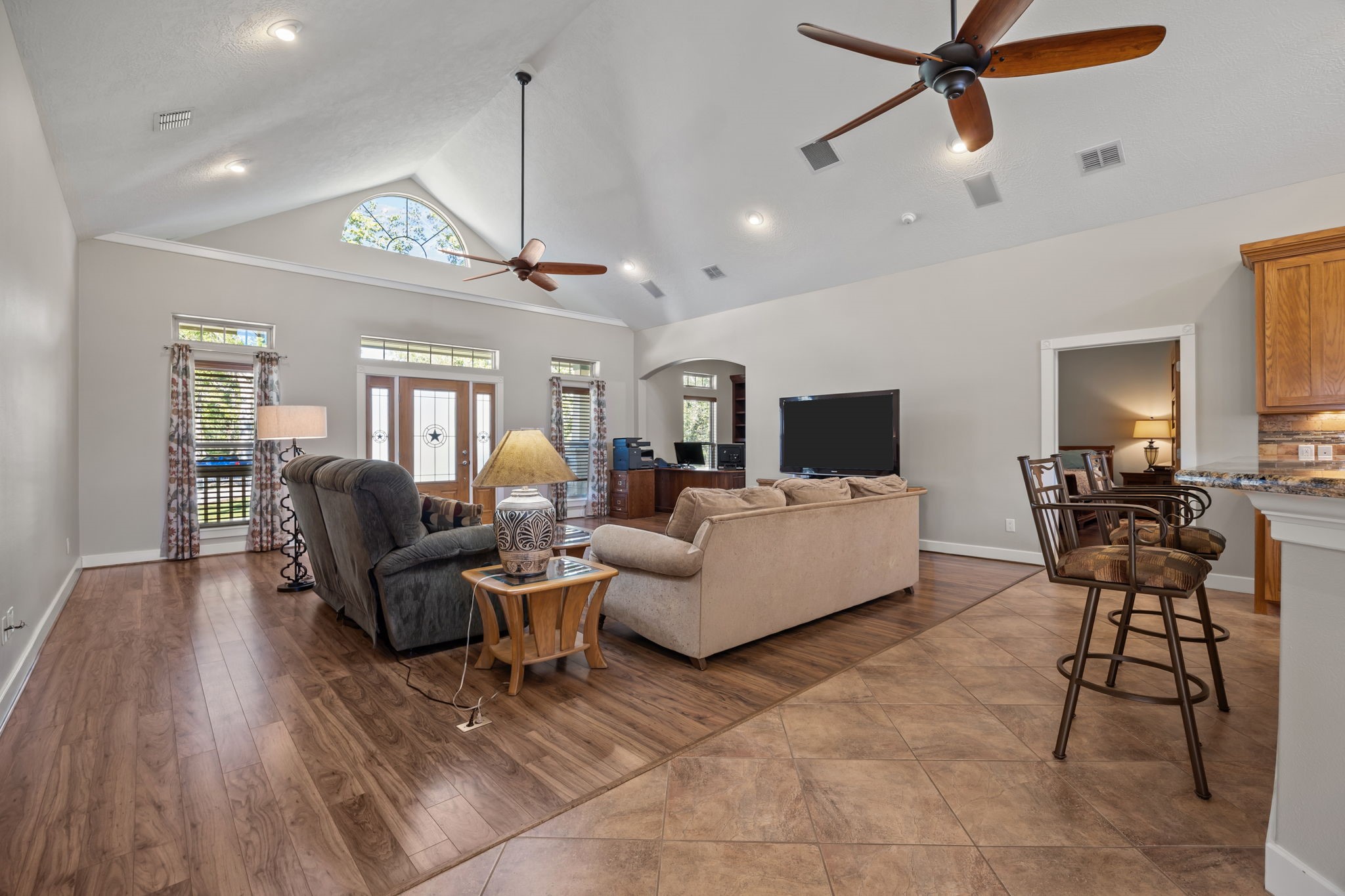 3998 County Road 612 Angleton, TX 77515 - Photo 12 of 47 a living room with furniture and a flat screen tv