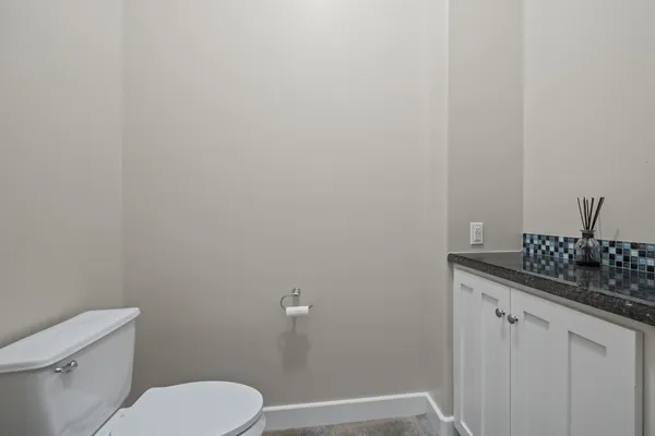 an aerial view of residential house with outdoor space and lake view