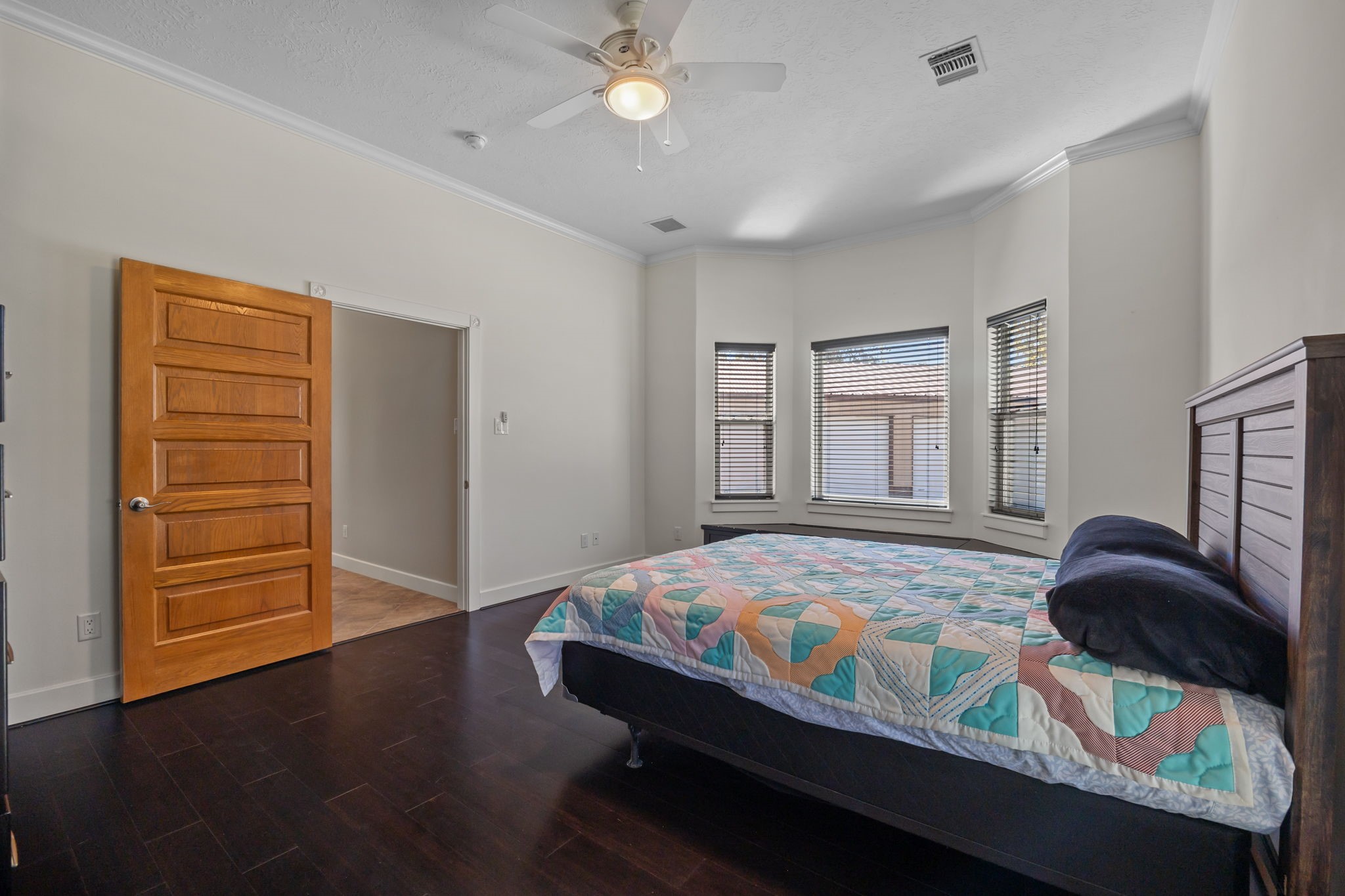 3998 County Road 612 Angleton, TX 77515 - Photo 30 of 47 a bedroom with a bed and a dresser