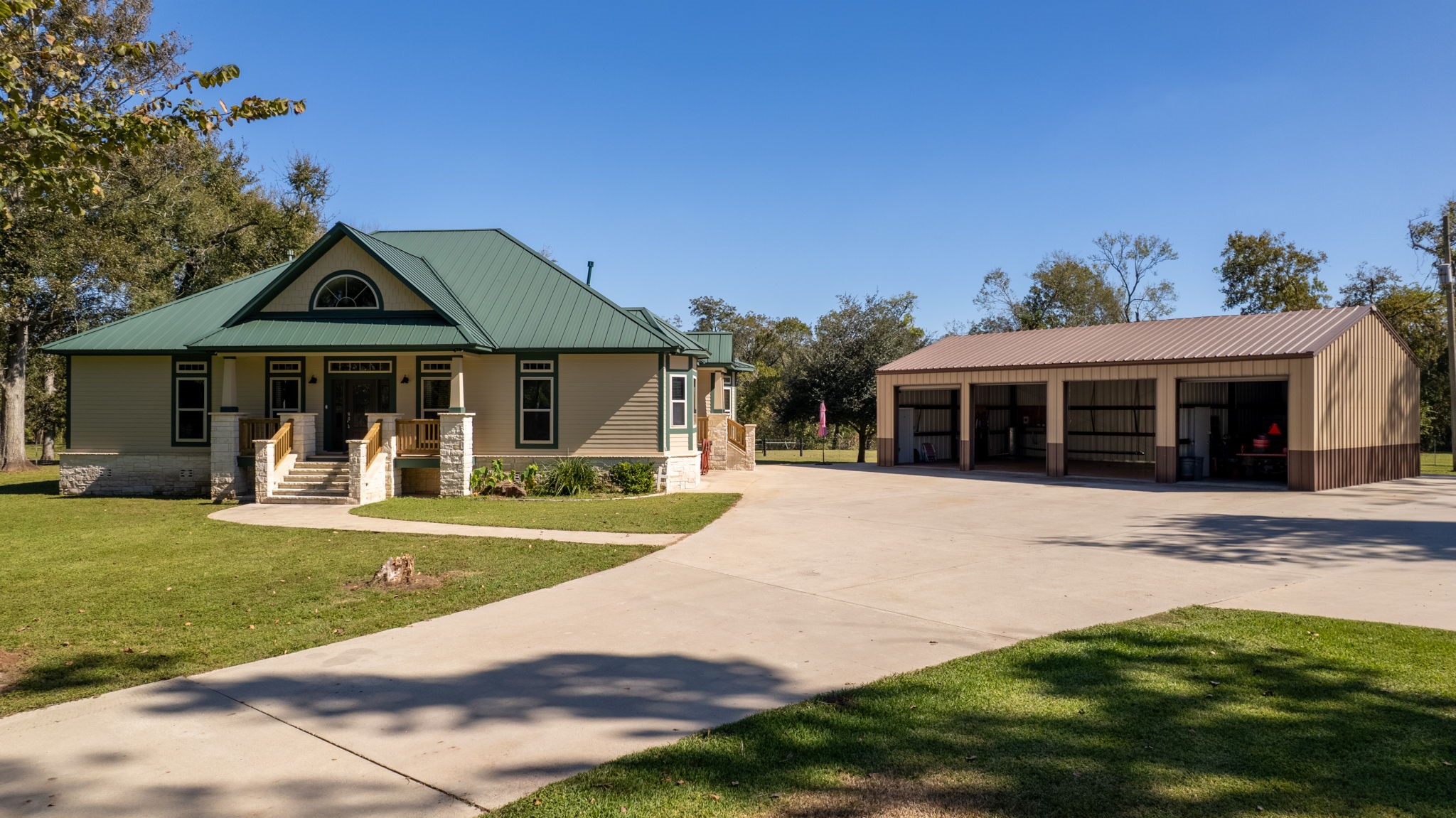 3998 County Road 612 Angleton, TX 77515 - Photo 3 of 47 a front view of a house with a yard