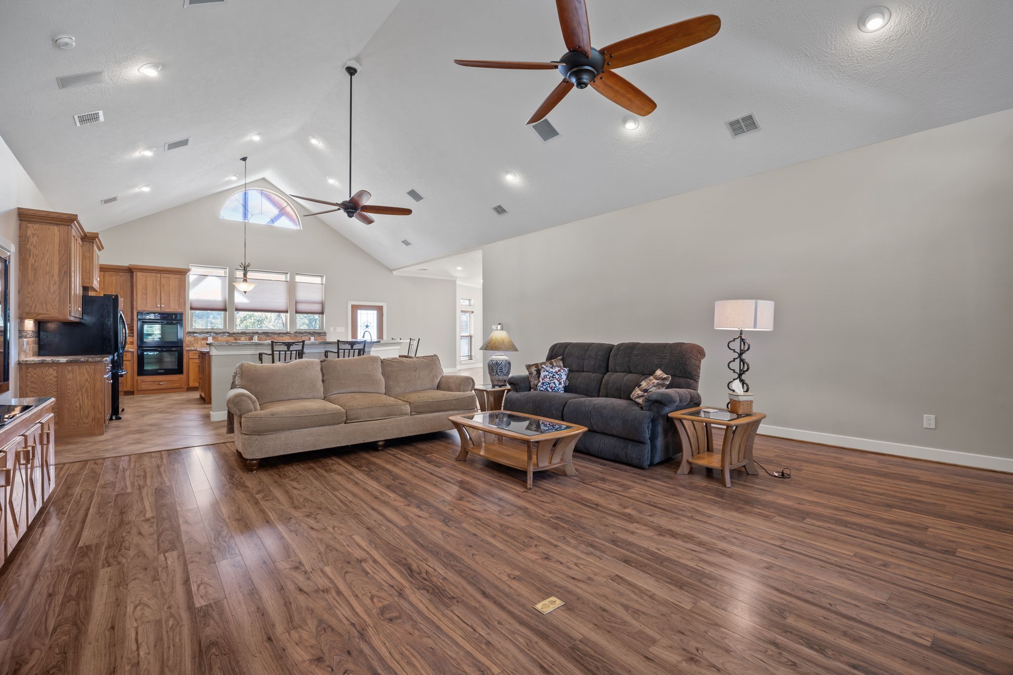 3998 County Road 612 Angleton, TX 77515 - Photo 7 of 47 a living room with furniture and a wooden floor