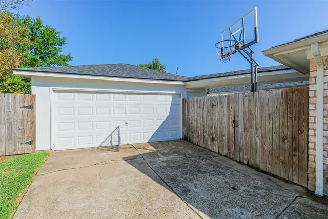 a backyard of a house with outdoor seating