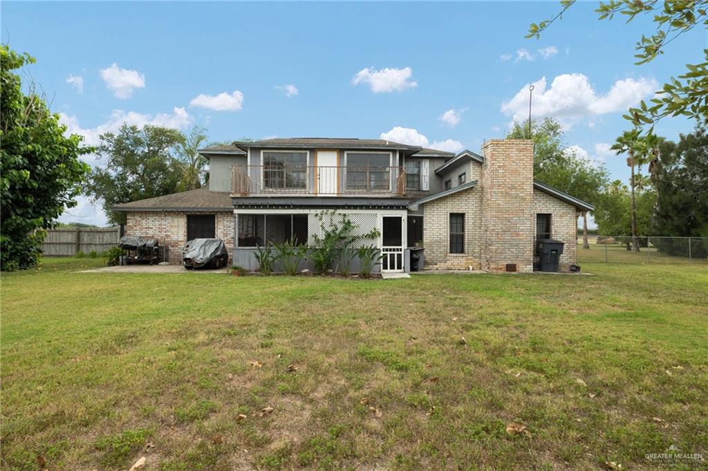 26813 Solis Road La Feria, TX 78559 - Photo 28 of 33 a front view of a house with a garden