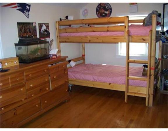 193 Abbott Street Springfield, MA 01118 - Photo 14 of 21 a bedroom with a bed and the view of window