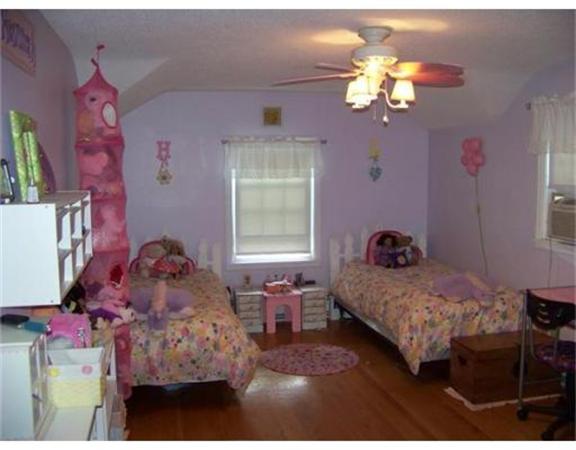 193 Abbott Street Springfield, MA 01118 - Photo 17 of 21 a bedroom with a bed dresser and window