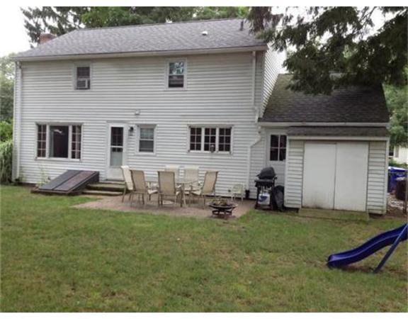 193 Abbott Street Springfield, MA 01118 - Photo 20 of 21 a house that has sitting area in backyard