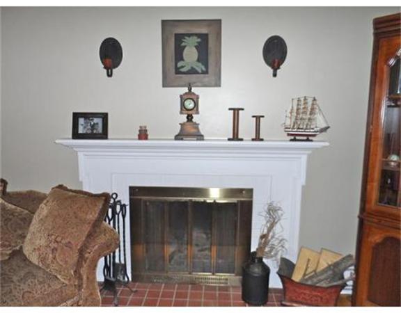 193 Abbott Street Springfield, MA 01118 - Photo 8 of 21 a living room with furniture and a fireplace