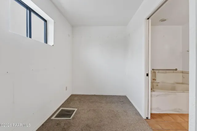 a view of a room with racks on the wall