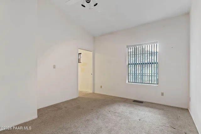 a house with trees in the background