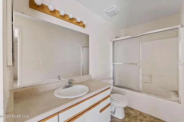 a view of a kitchen with a sink