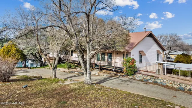 an aerial view of residential house with outdoor space and mountain view