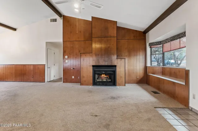 a kitchen with cabinets appliances and a counter top