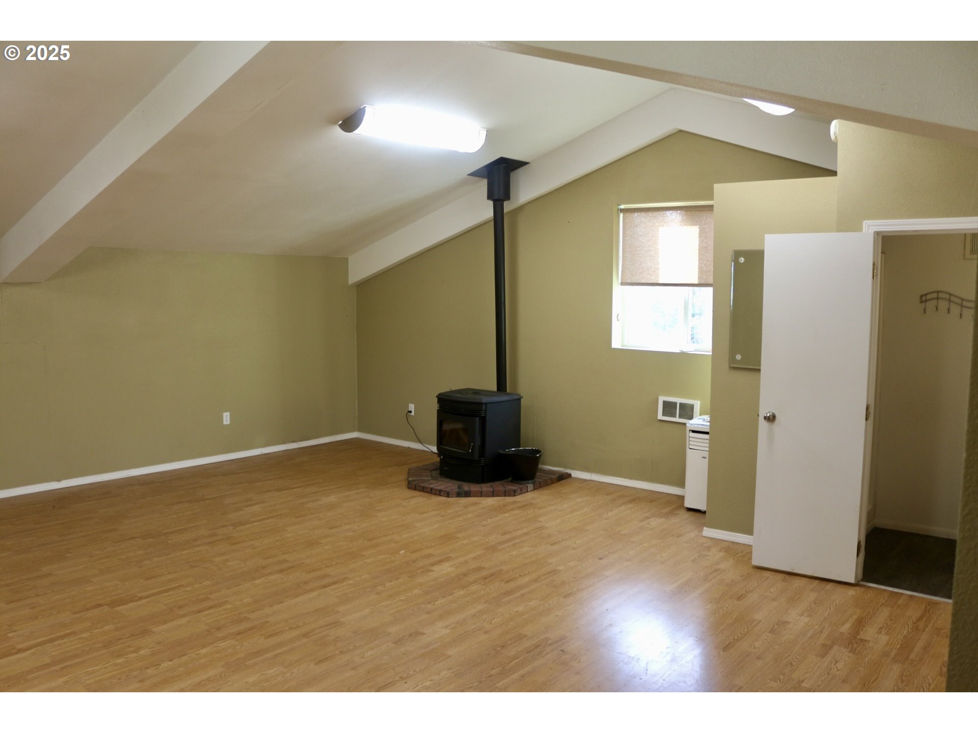 475 Thomas ( 471) Road Sutherlin, OR 97479 - Photo 35 of 43 a view of an empty room with wooden floor