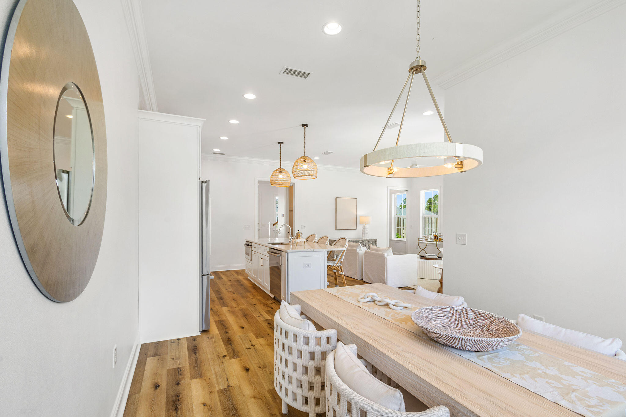 11 Bunting Ln Inlet Beach Inlet Beach, FL 32461 - Photo 22 of 70 a dining room with wooden floor a chandelier a wooden table and chairs